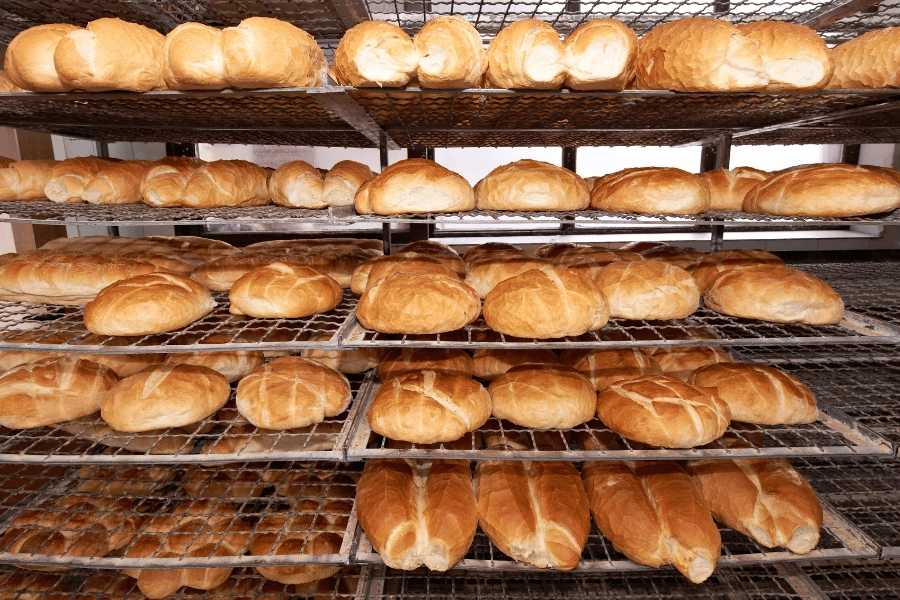 fresh baked bread on cooling racks 